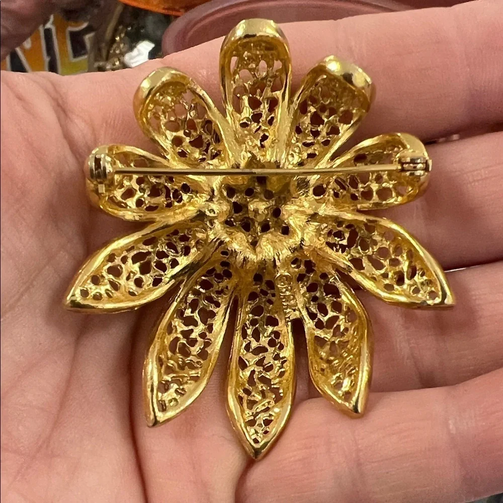 Elegant Gold Floral Brooch with Multicolor Accents